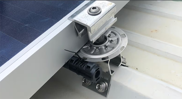 Solar panels mounted to exposed fastener roof